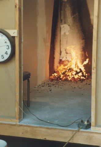Fire is ignited in the corner of a SIPs building.