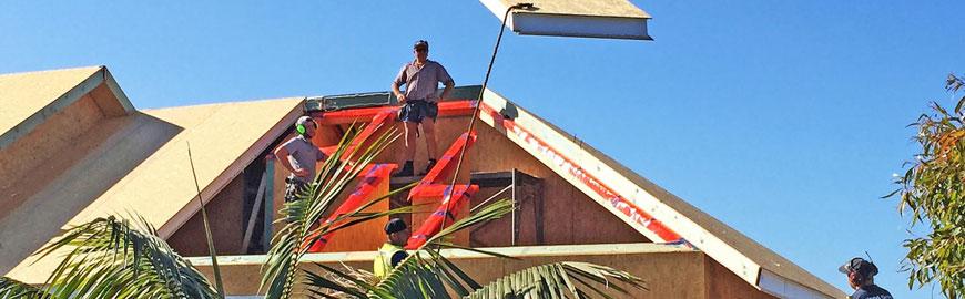 Securing the roof panels on the Cottesloe home